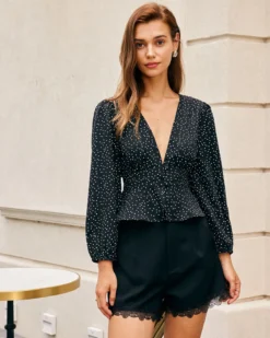 The Black V Neck Ruffle Polka Dot Blouse