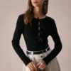 The Black Boat Neck Bowknot Front Knit Top