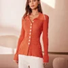 The Orange Lapel Seam Colorblock Knit Top