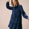 The Blue Tie-Neck Tiered Babydoll Mini Dress
