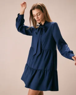 The Blue Tie-Neck Tiered Babydoll Mini Dress
