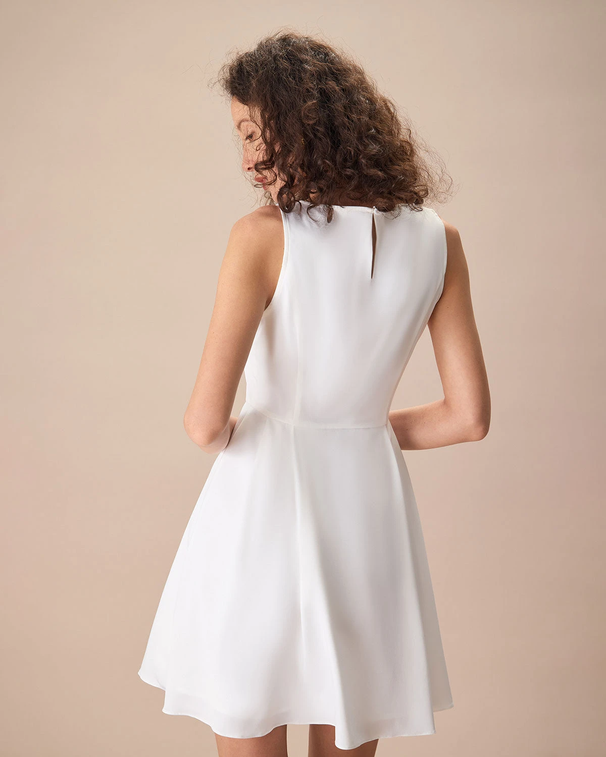 The White Round Neck Pleated Mini Dress 4 The White Round Neck Pleated Mini Dress - Image 4