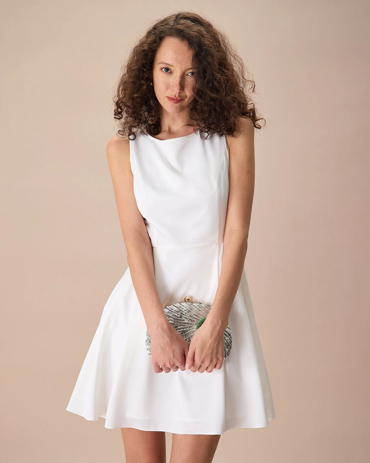 The White Round Neck Pleated Mini Dress 1 The White Round Neck Pleated Mini Dress